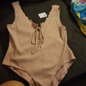 Baby pink body suit